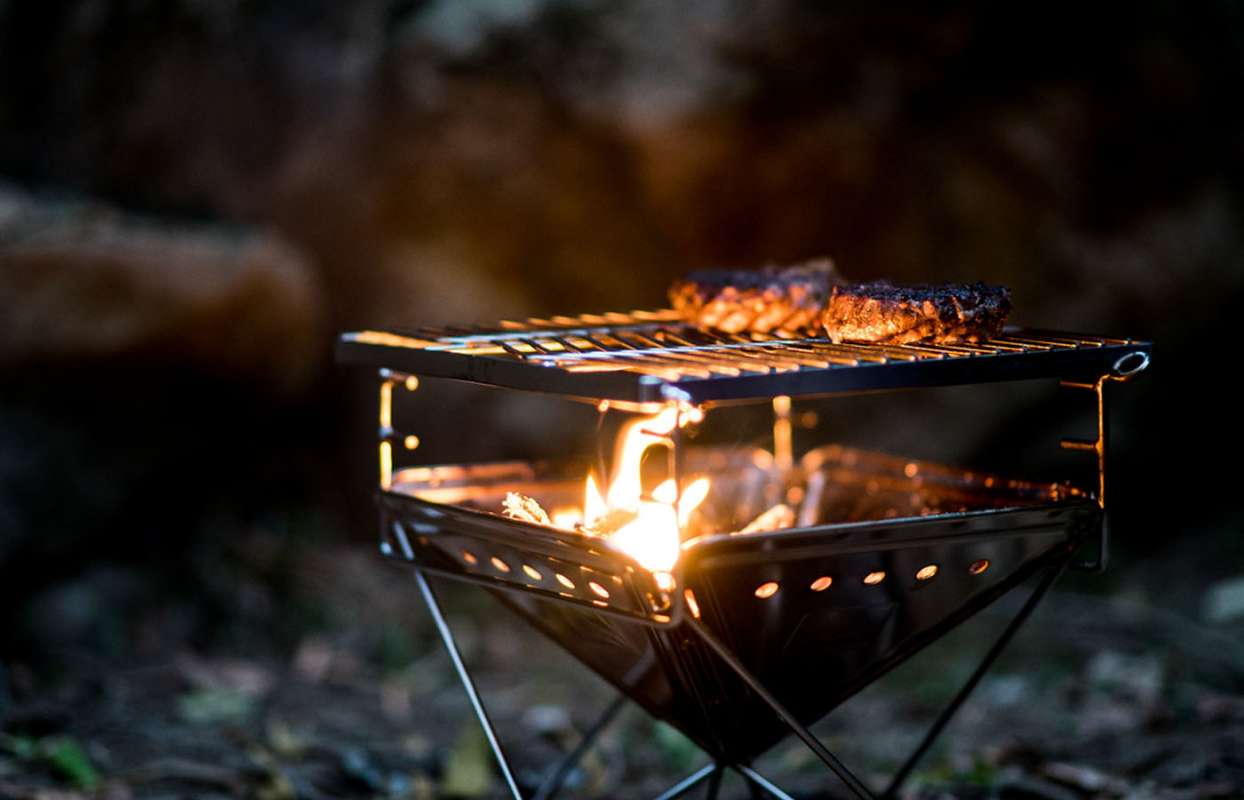 The Snow Peak Fire Pit small, compact, portable, and perfect for