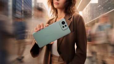 Young woman holding the new ASUS Zenfone 12 Ultra