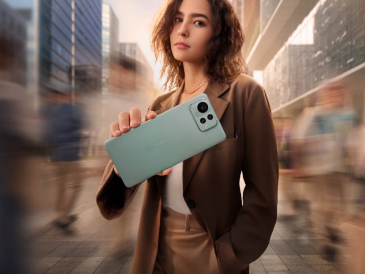 Young woman holding the new ASUS Zenfone 12 Ultra